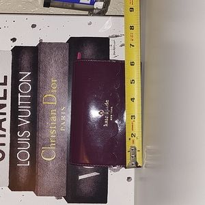 EUC Kate Spade trifold wallet, burgundy patent Leather outside/pink leather insi